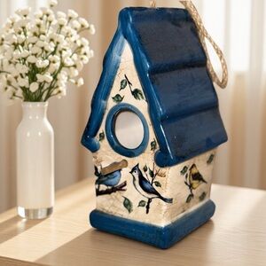Charming Blue and Cream Birdhouse with Bird Motif